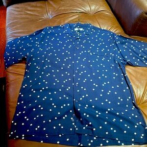 Men’s short sleeve casual shirt. 100% rayon, blue with white stars.